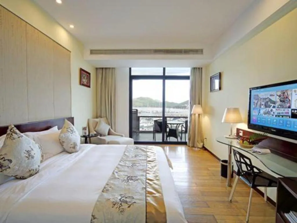 Bed in Serenity Marina Hotel