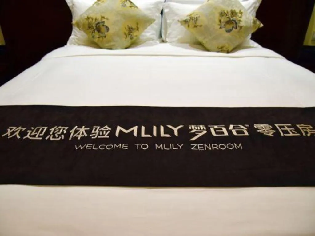 Bed in Serenity Marina Hotel