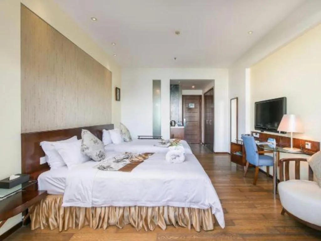 Bed in Serenity Marina Hotel