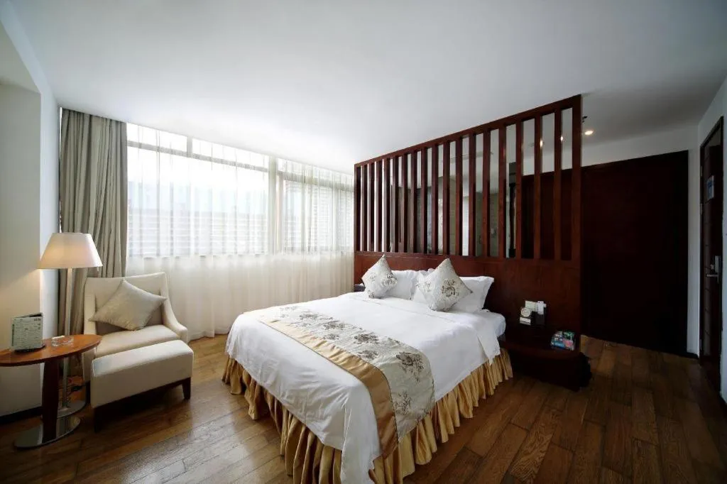 Bed in Serenity Marina Hotel