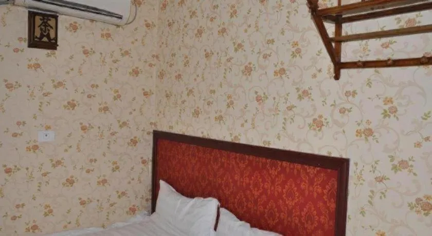 Bed in Pingyao Yufengheng Hotel