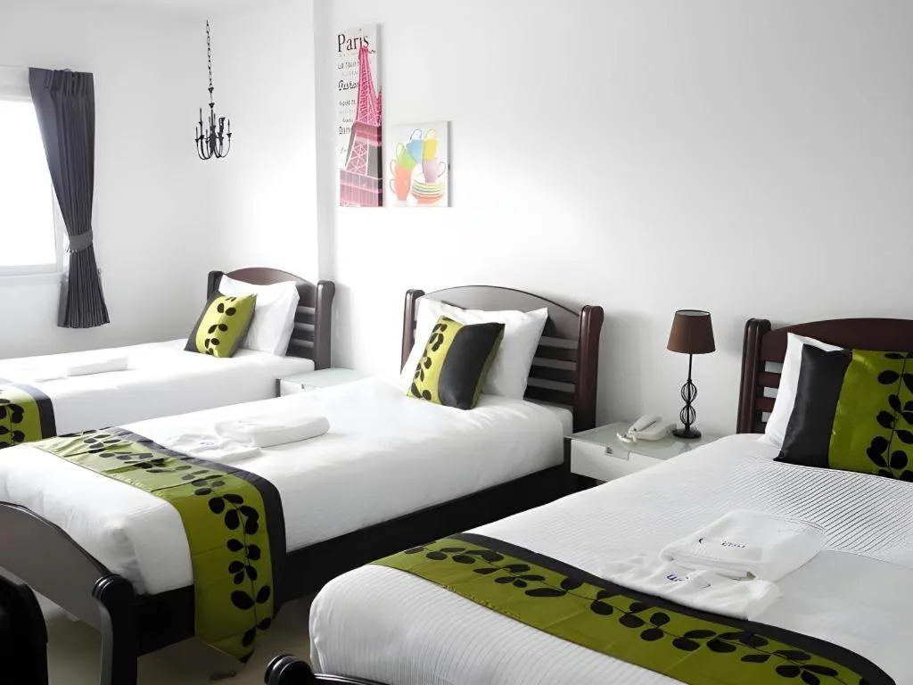 Bed in Phet Cha-am Plaza&Resort