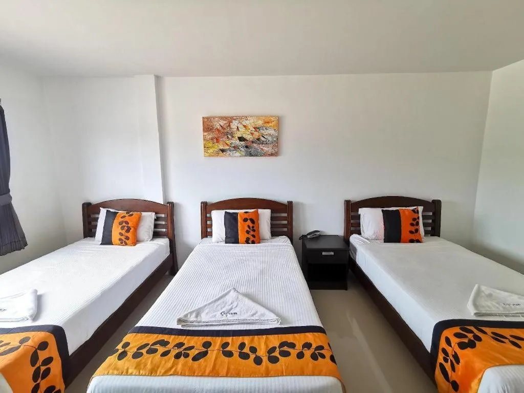 Bed in Phet Cha-am Plaza&Resort