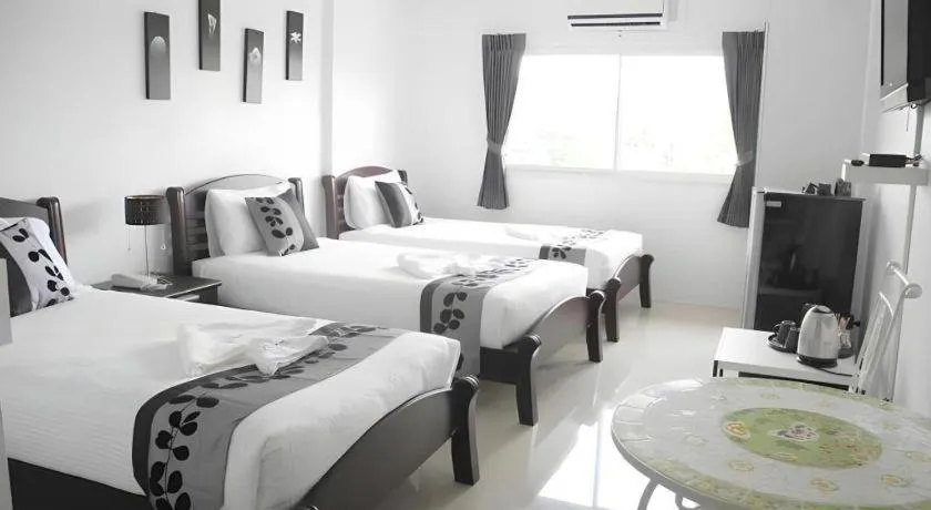 Bed in Phet Cha-am Plaza&Resort