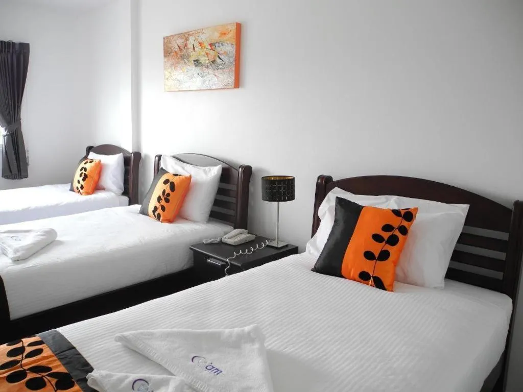 Bed in Phet Cha-am Plaza&Resort