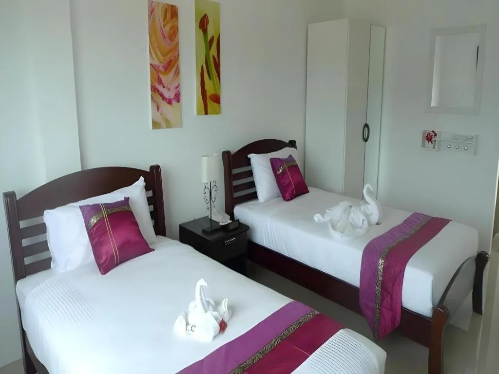 Bed in Phet Cha-am Plaza&Resort