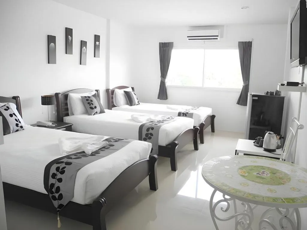 Bed in Phet Cha-am Plaza&Resort