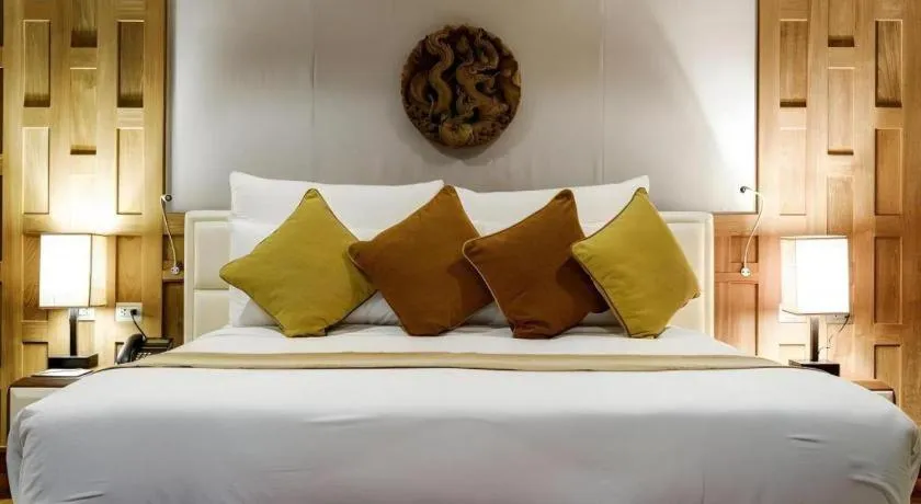 Bed in Baan Souchada Resort & Spa