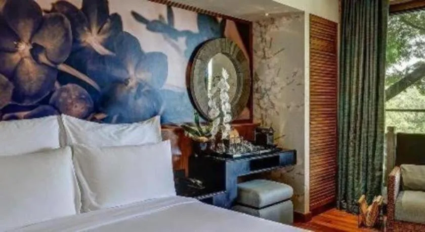 Bed in Baan Souchada Resort & Spa