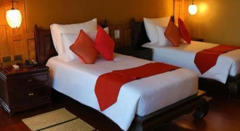 Bed in Baan Souchada Resort & Spa