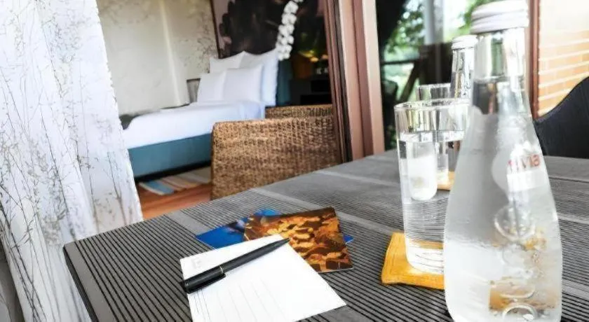 Bed in Baan Souchada Resort & Spa