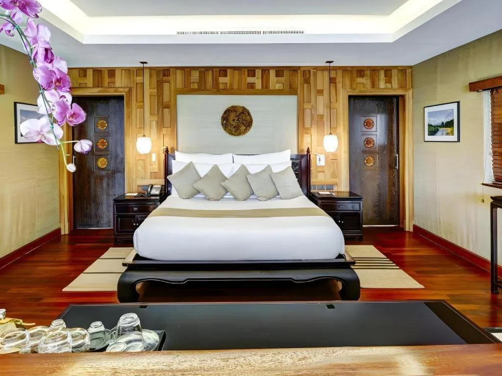 Bed in Baan Souchada Resort & Spa