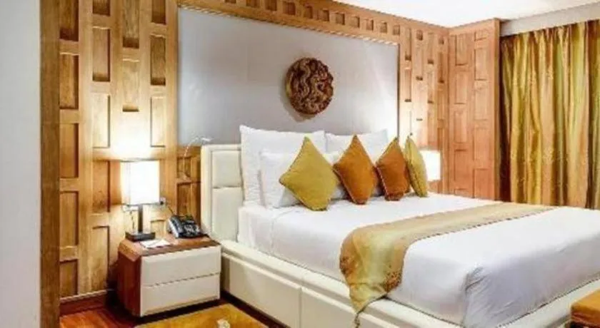 Bed in Baan Souchada Resort & Spa