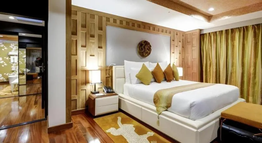 Bed in Baan Souchada Resort & Spa