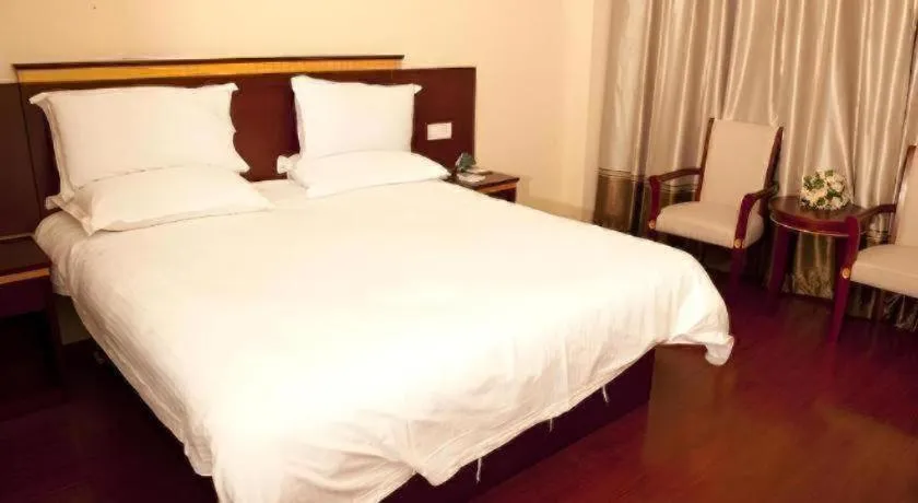 Bed in GreenTree Inn Shanghai Minhang Development Zone Subway Station Business Hotel