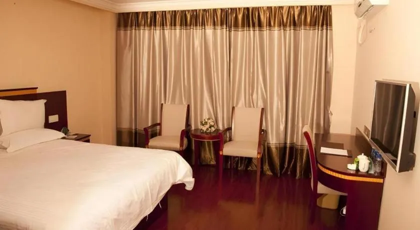 Bed in GreenTree Inn Shanghai Minhang Development Zone Subway Station Business Hotel