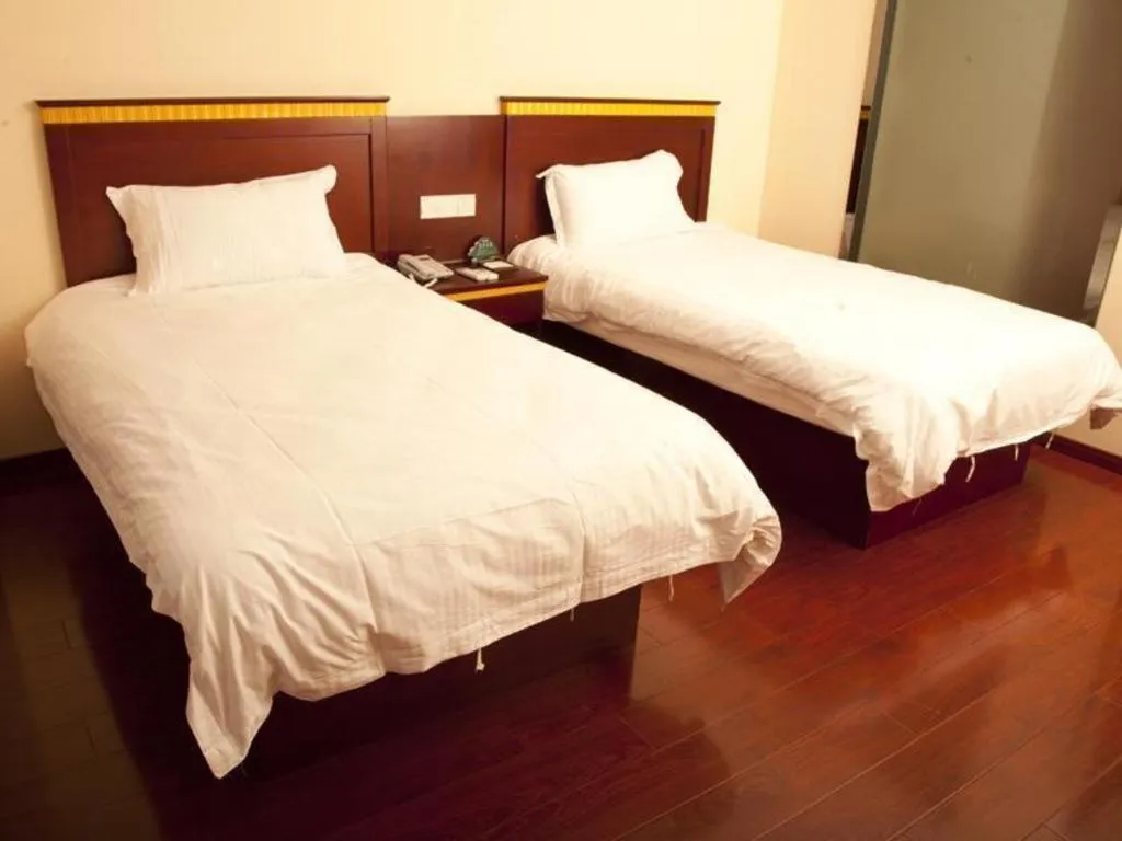 Bed in GreenTree Inn Shanghai Minhang Development Zone Subway Station Business Hotel