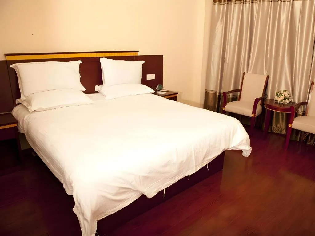 Bed in GreenTree Inn Shanghai Minhang Development Zone Subway Station Business Hotel