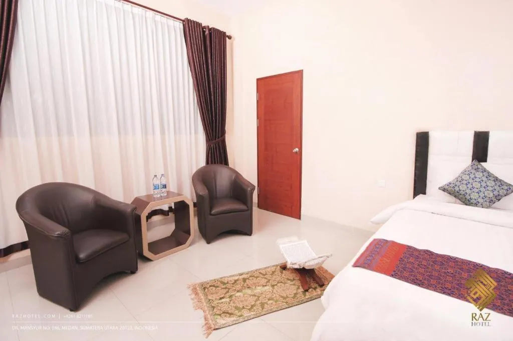 Bed in Raz Hotel and Convention