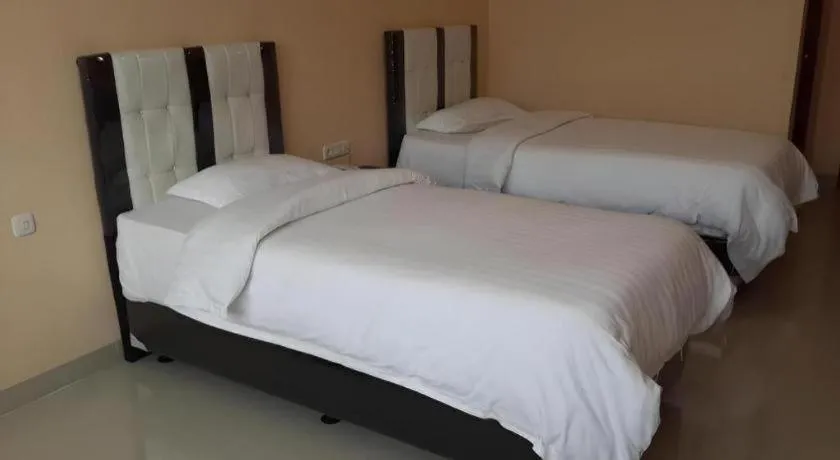 Bed in Raz Hotel and Convention