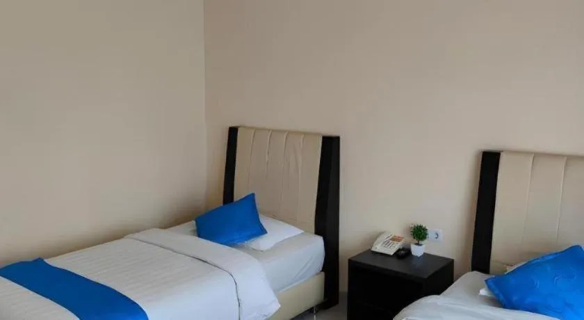 Bed in Raz Hotel and Convention