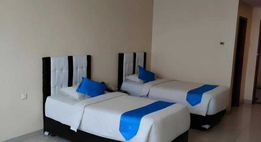 Bed in Raz Hotel and Convention