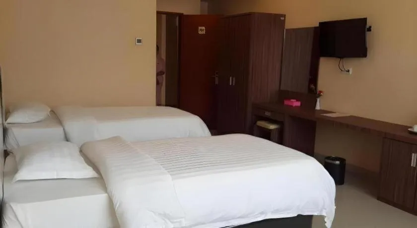 Bed in Raz Hotel and Convention