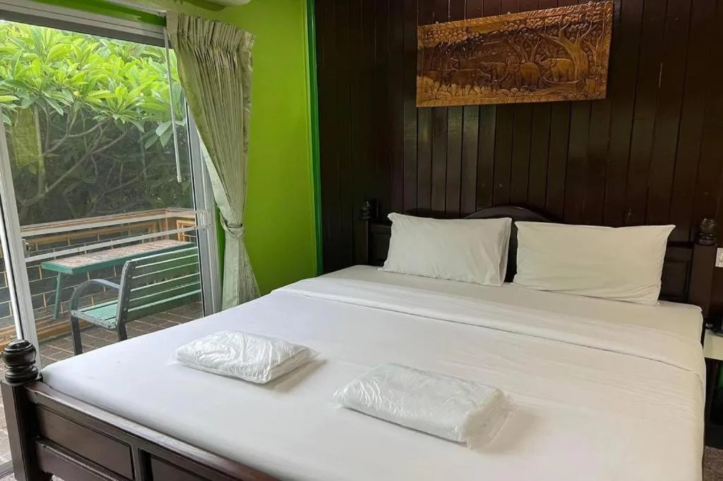 Bed in Hihotel Saraburi