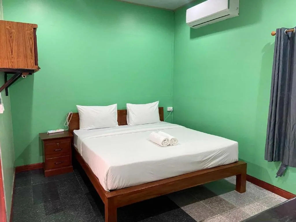 Bed in Hihotel Saraburi