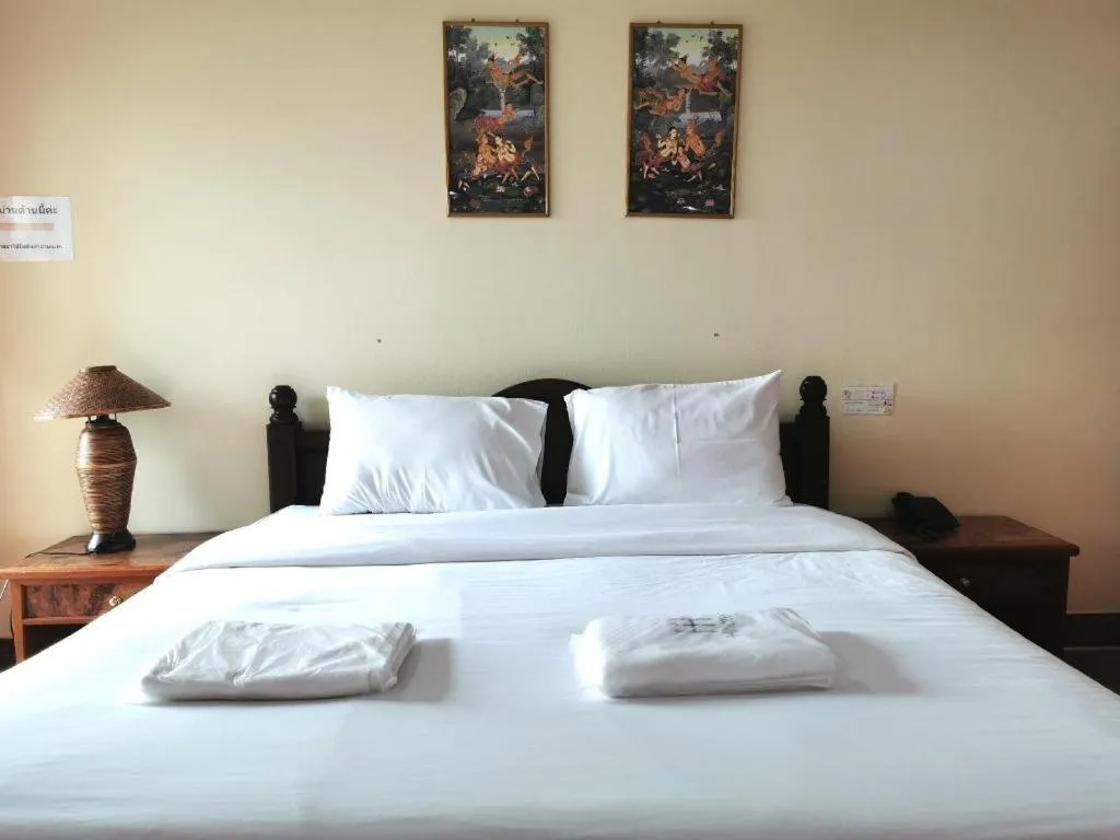 Bed in Hihotel Saraburi