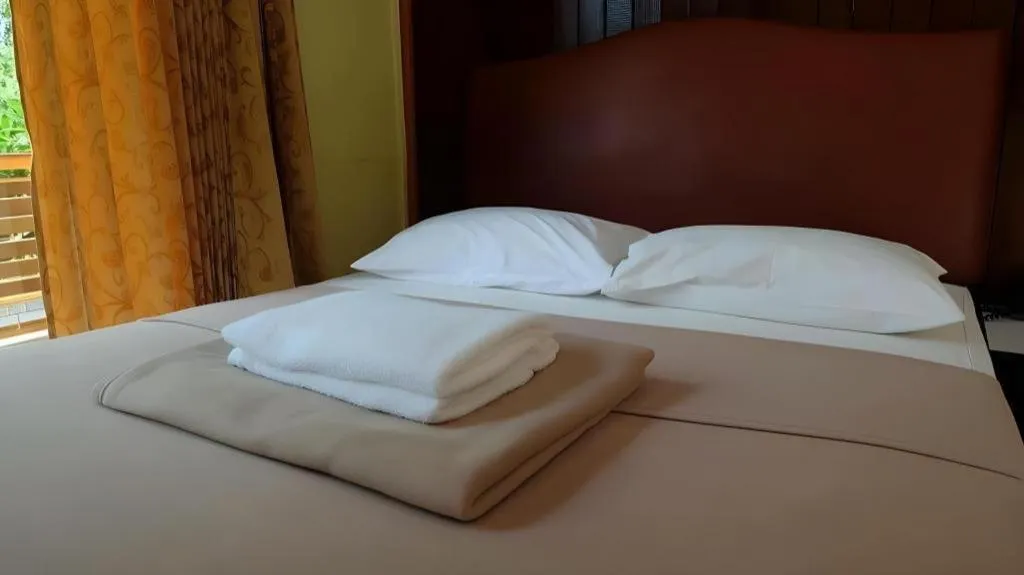 Bed in Hihotel Saraburi
