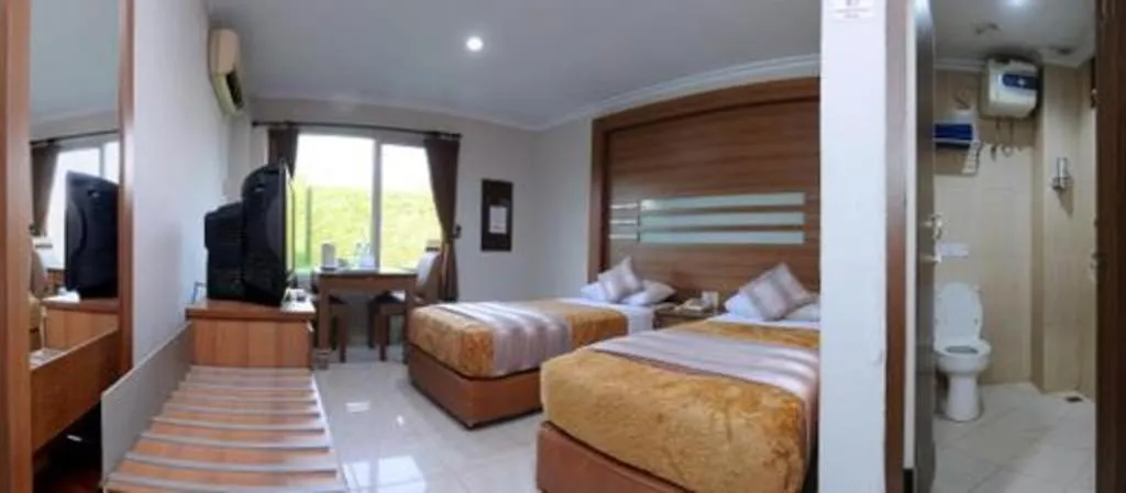 Bed in Hotel Senen Indah Syariah