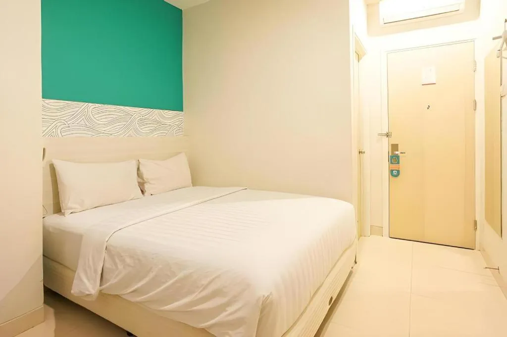 Bed in Makassar Beach Inn