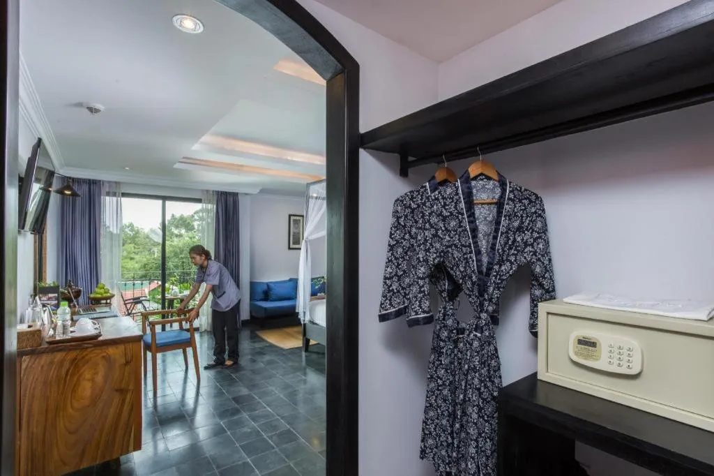 Bed in The Grand Cyclo Boutique Suite & Spa