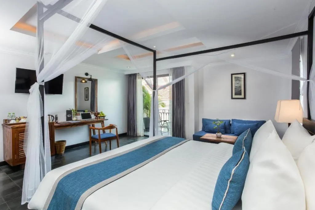 Bed in The Grand Cyclo Boutique Suite & Spa