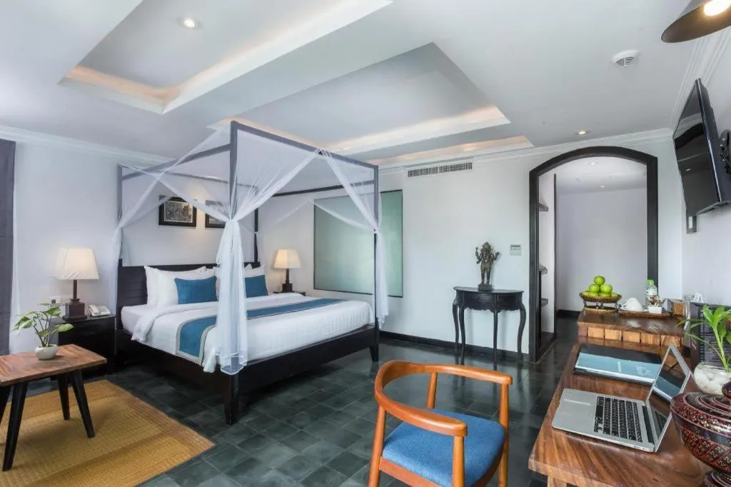 Bed in The Grand Cyclo Boutique Suite & Spa