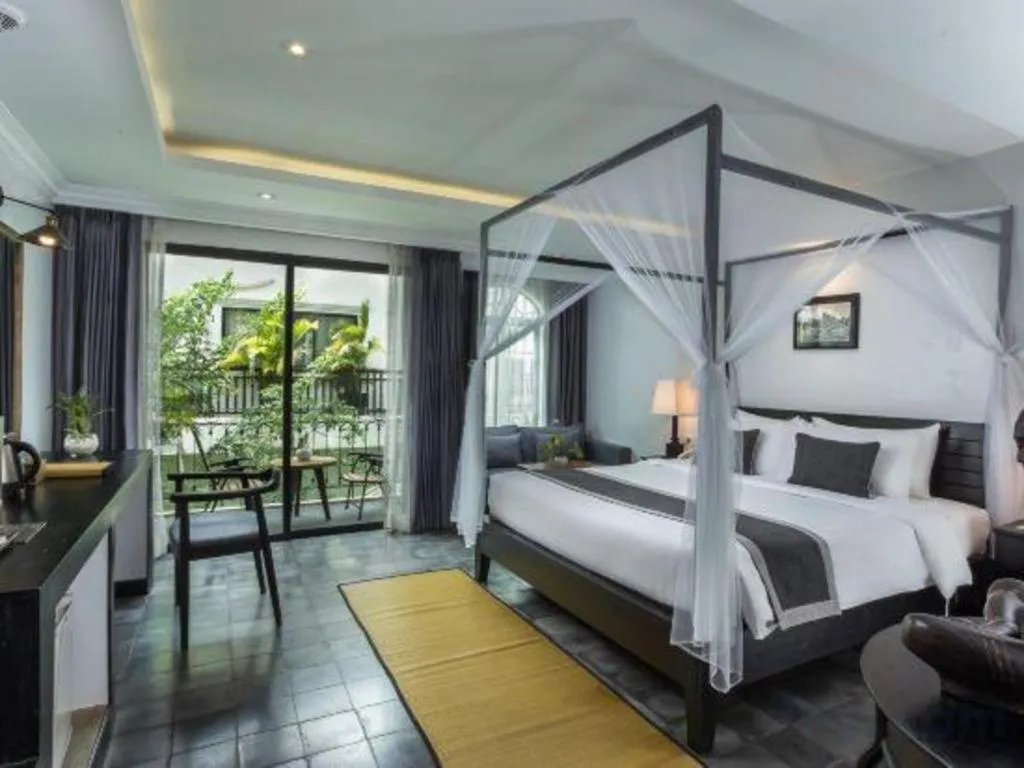 Bed in The Grand Cyclo Boutique Suite & Spa