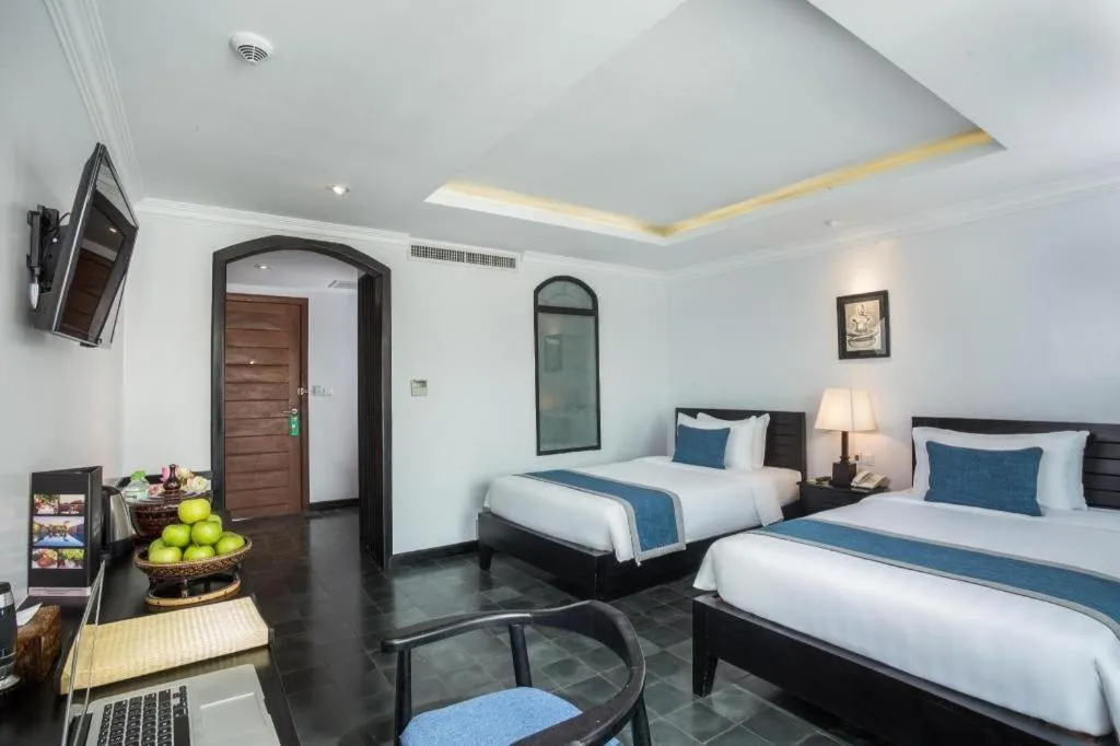 Bed in The Grand Cyclo Boutique Suite & Spa