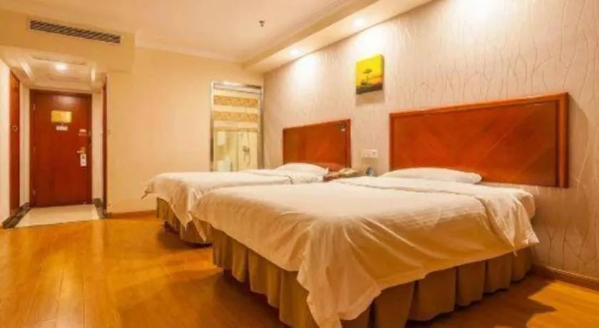 Bed in GreenTree Inn Kunshan Shimao Plaza Business Hotel