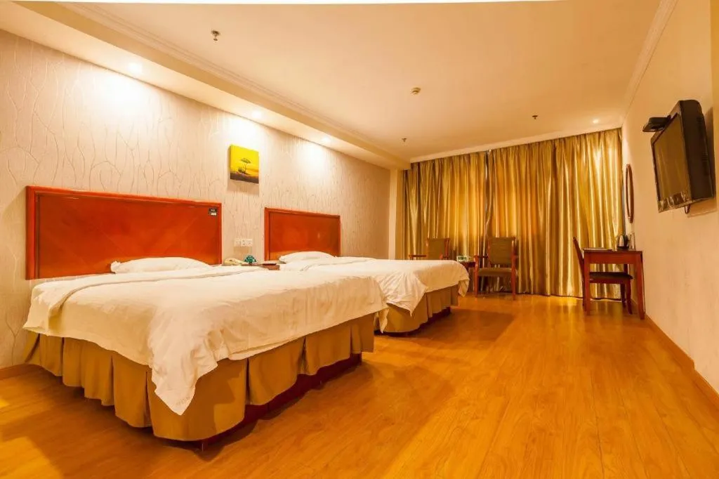 Bed in GreenTree Inn Kunshan Shimao Plaza Business Hotel