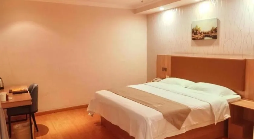 Bed in GreenTree Inn Kunshan Shimao Plaza Business Hotel