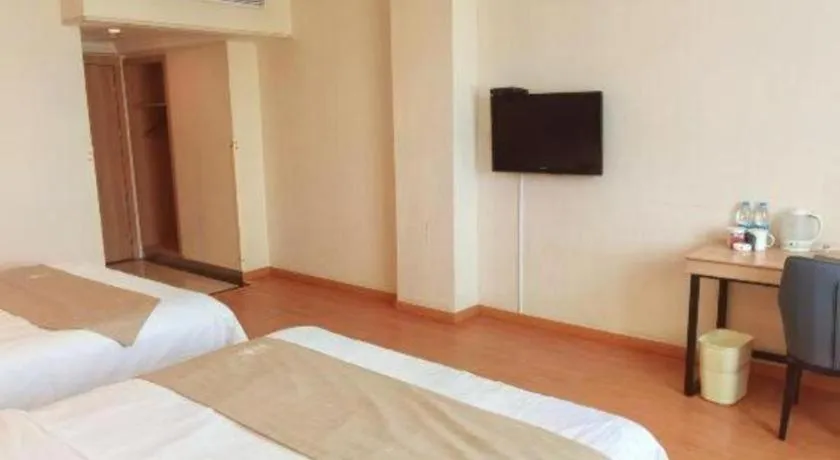 Bed in GreenTree Inn Kunshan Shimao Plaza Business Hotel