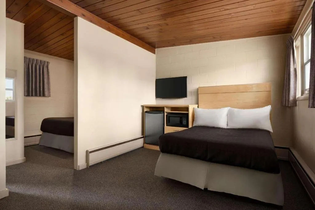 Bed in Thriftlodge Moose Jaw