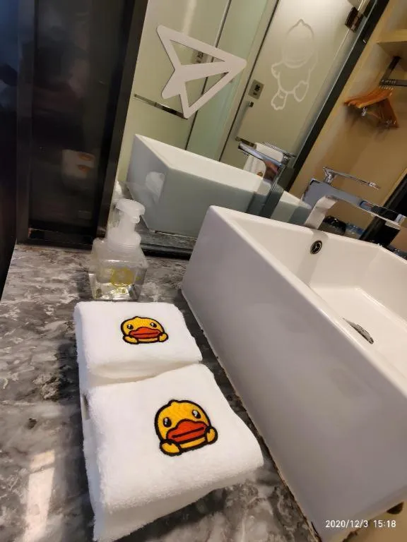 Bed in Echarm Hotel Qionghai Wanquan River