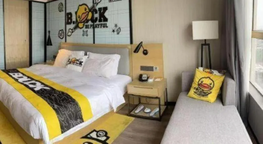 Bed in Echarm Hotel Qionghai Wanquan River