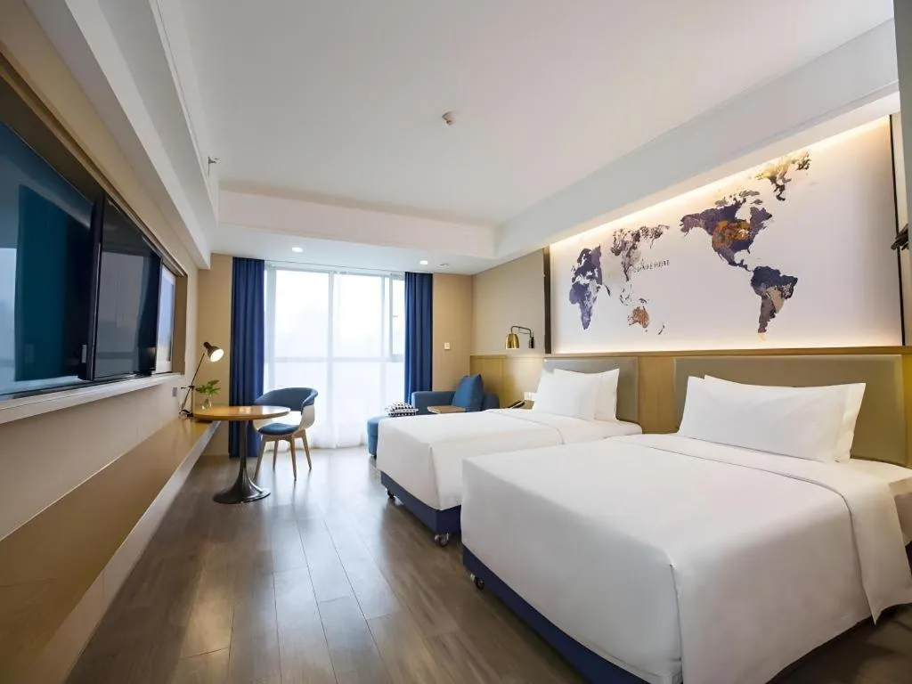 Bed in Kyriad Marvelous Hotel·Xi'an North High-speed Railway Station