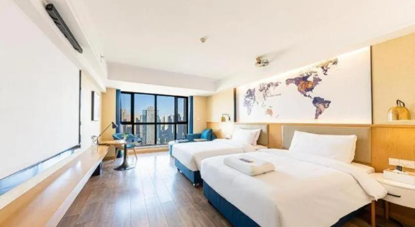 Bed in Kyriad Marvelous Hotel·Xi'an North High-speed Railway Station