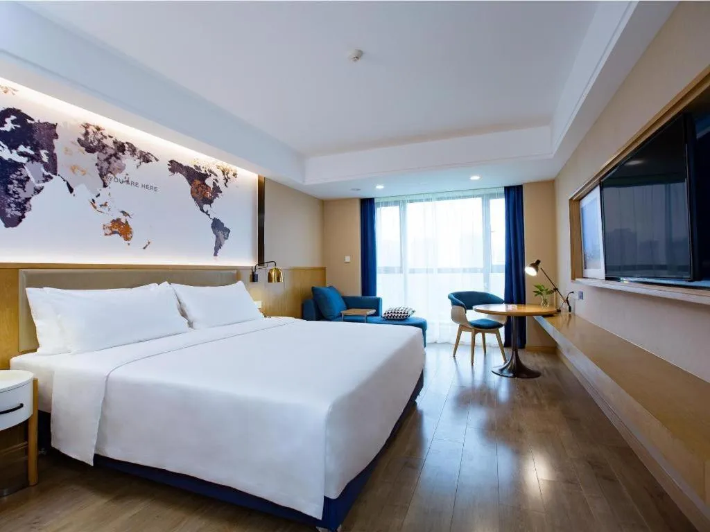 Bed in Kyriad Marvelous Hotel·Xi'an North High-speed Railway Station