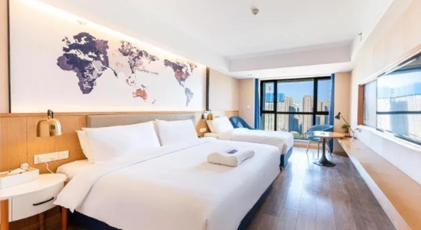 Bed in Kyriad Marvelous Hotel·Xi'an North High-speed Railway Station