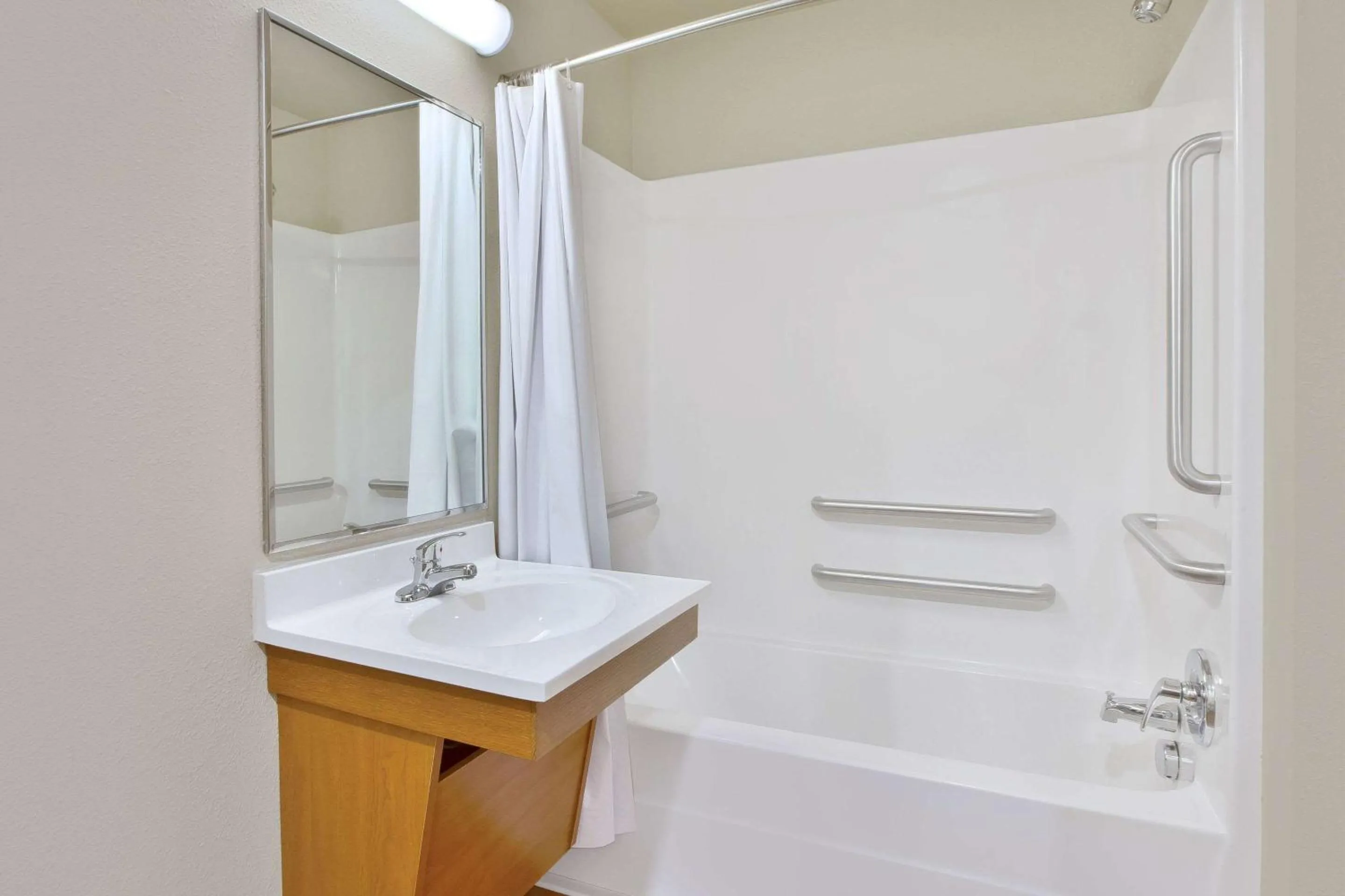 Bathroom in WoodSpring Suites Columbus North I-270